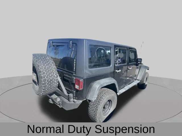 Used 2011 Black Jeep Unlimited Sport image 6