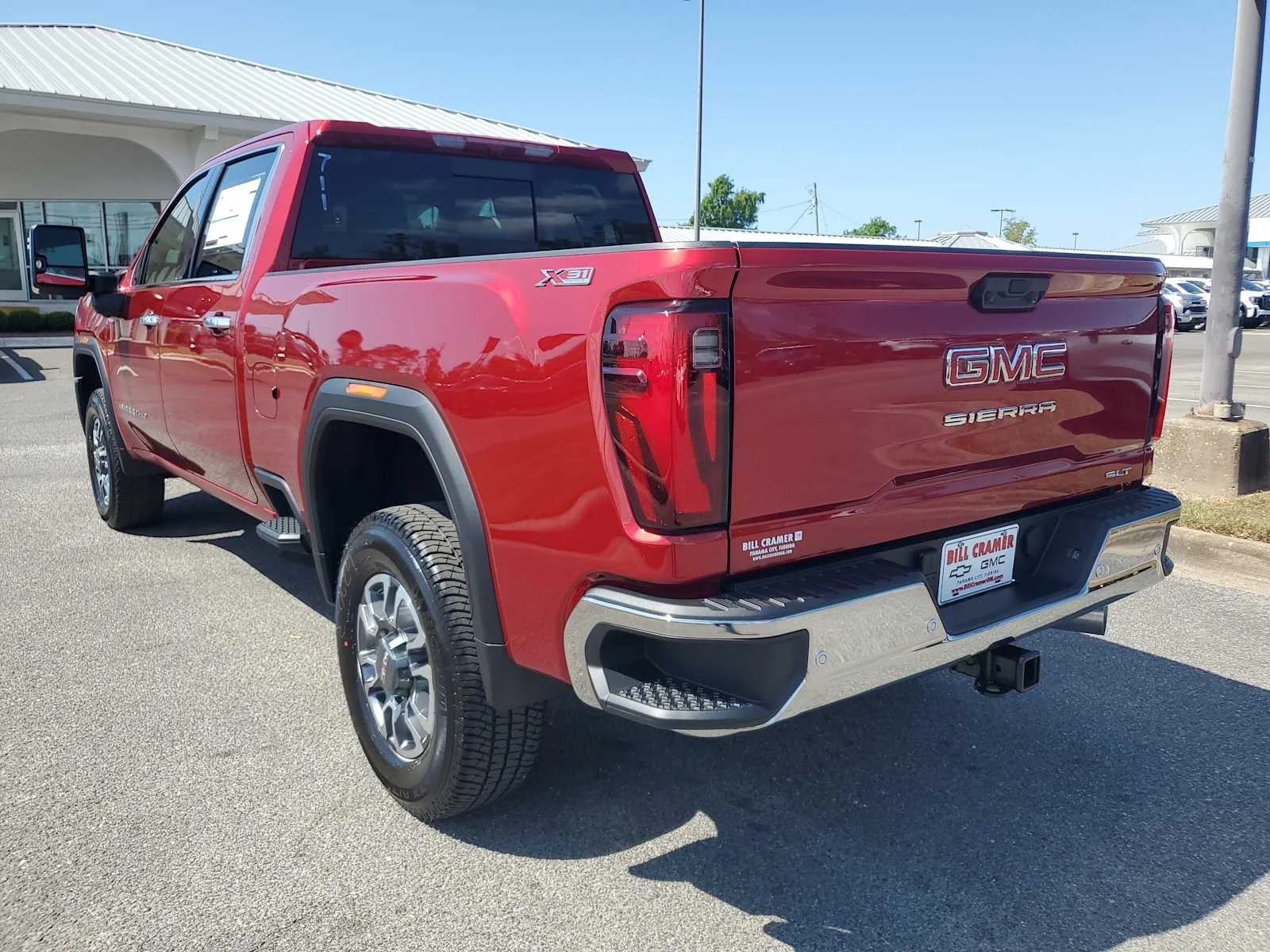 New 2026 Volcanic Red Tintcoat GMC SLT image 3