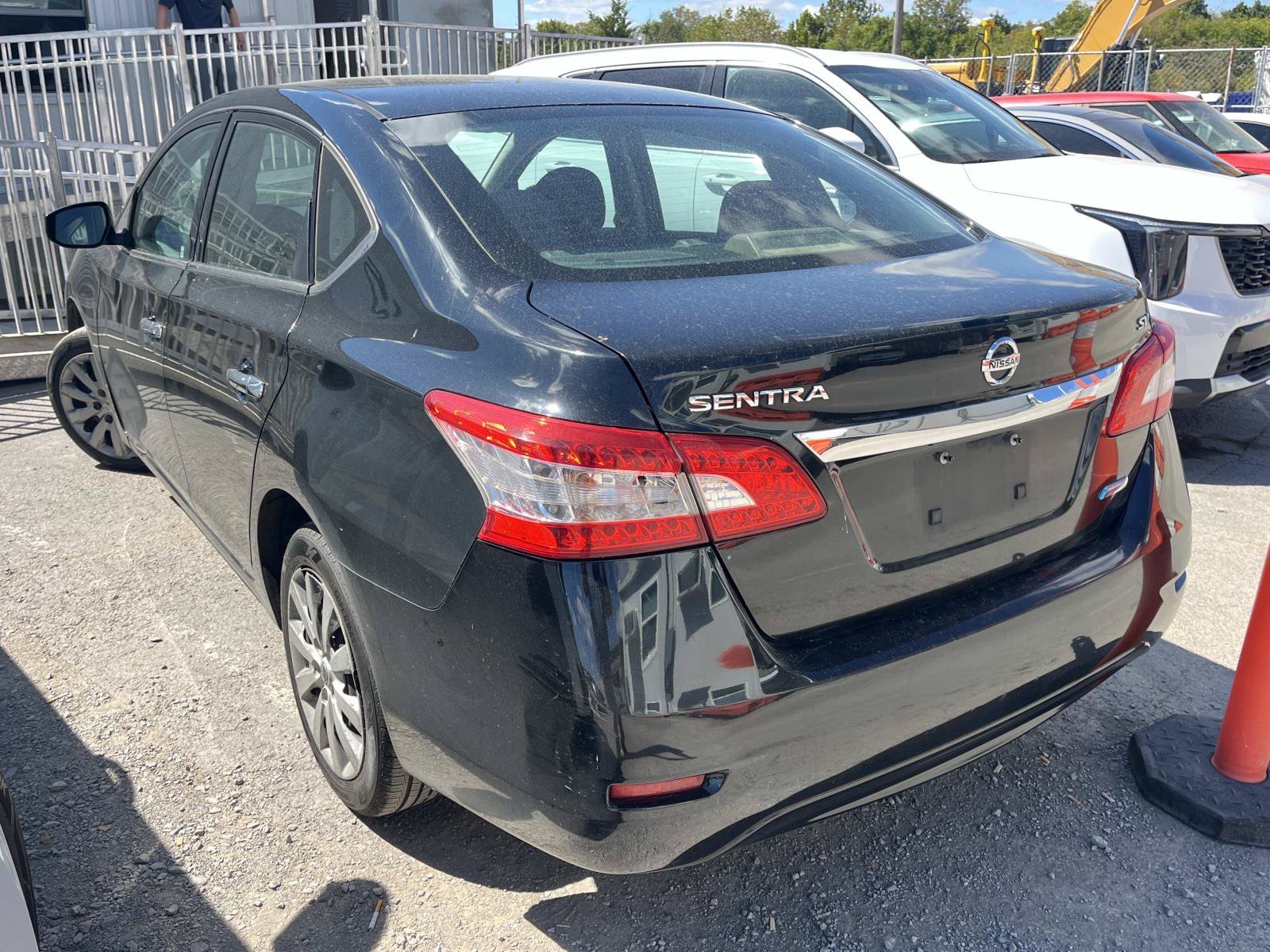Used 2014 Super Black Nissan SV image 3