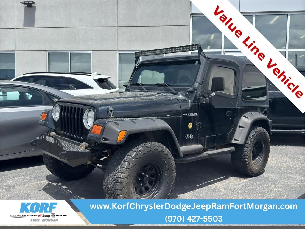 Used 2001 Black Jeep SE image 1