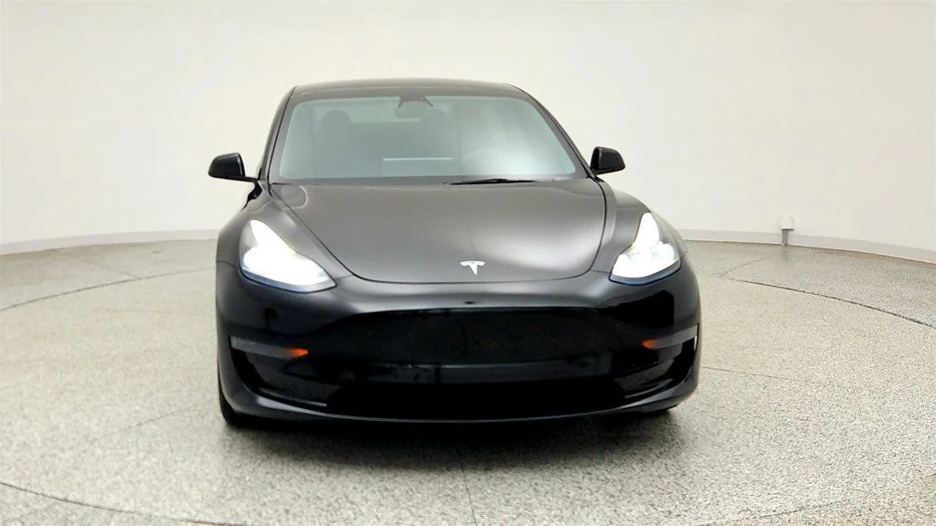 Used 2023 Solid Black Tesla RWD image 2