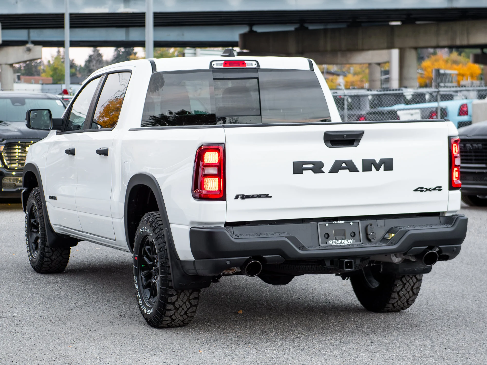 New 2026 White RAM Rebel* Crew Cab 4x4, Heated Seats/Wheel, 33 Inch A/T Tires, Rear Locking Diff image 4
