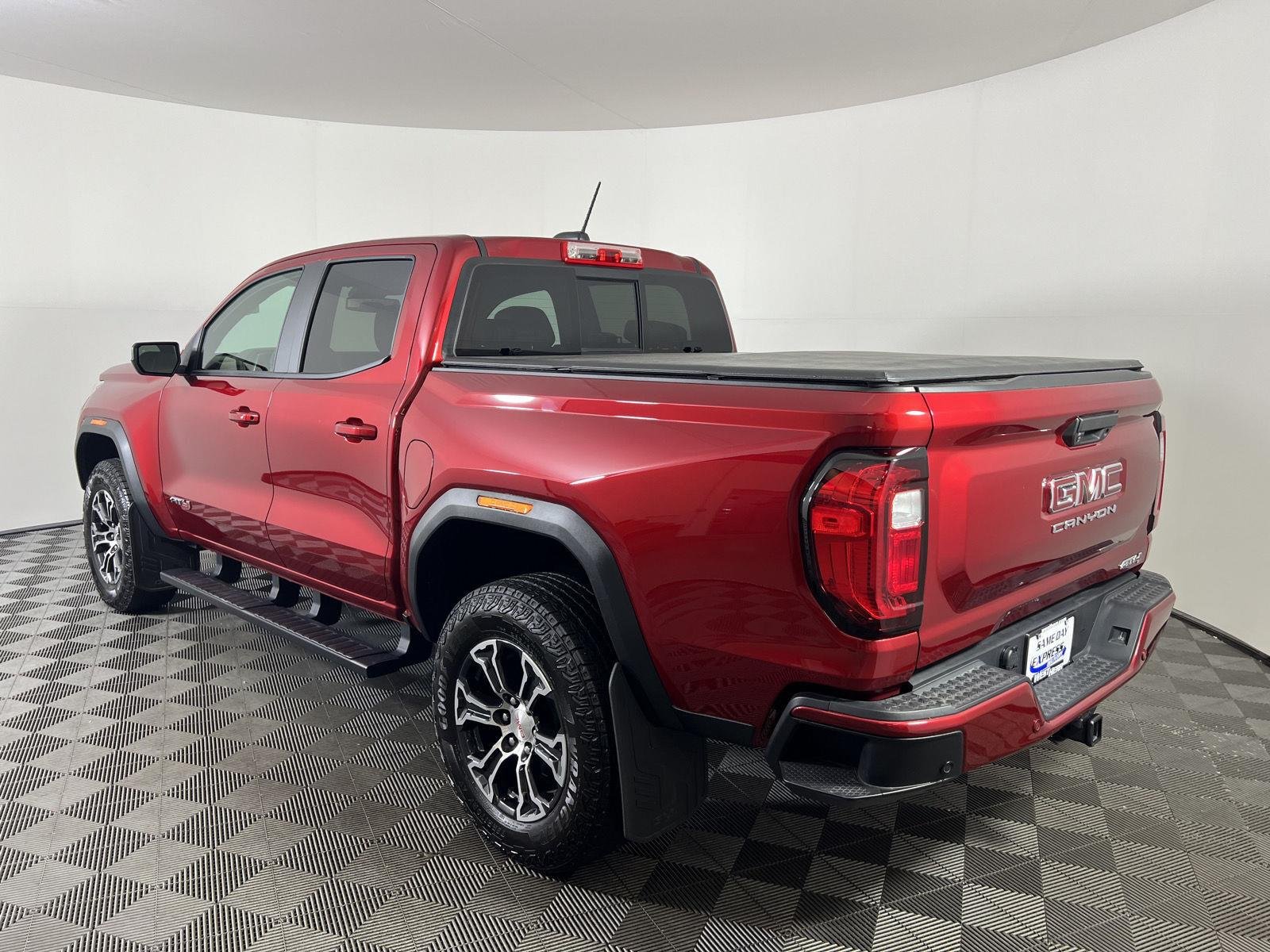Used 2025 Volcanic Red Tintcoat GMC 4WD AT4 image 23