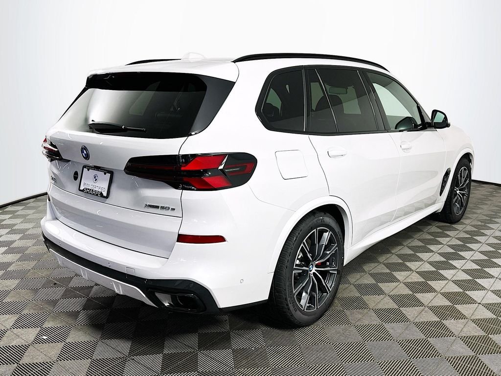 Used 2026 White Metallic BMW xDrive50e image 5