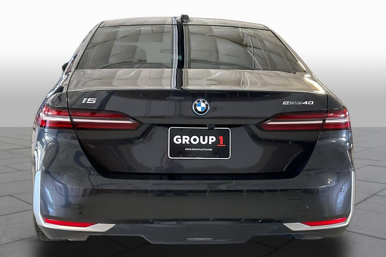 Certified Used 2024 Dark Graphite Metallic BMW eDrive40 image 4