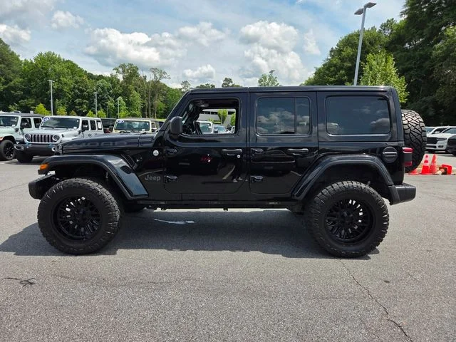 Used 2019 Black Jeep Unlimited Sahara image 4