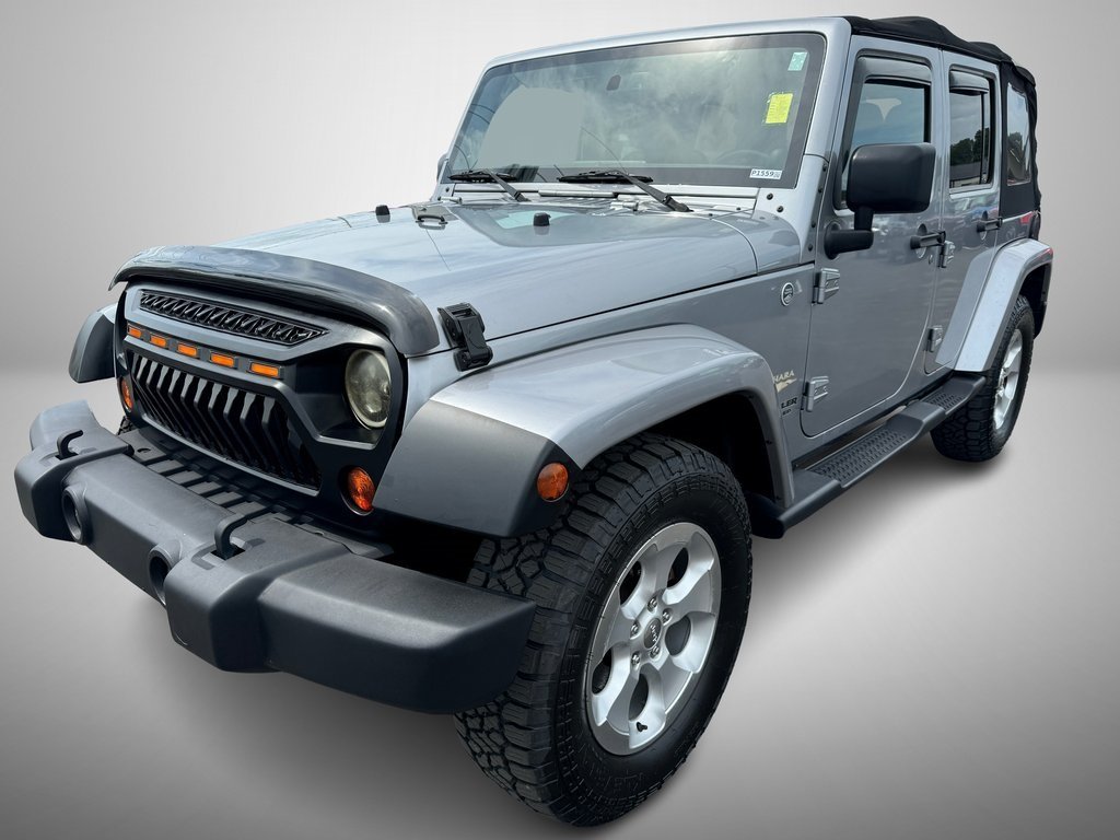 Used 2013 Jeep Wrangler Unlimited Sahara with VIN 1C4BJWEG8DL629329 for sale in Albertville, AL