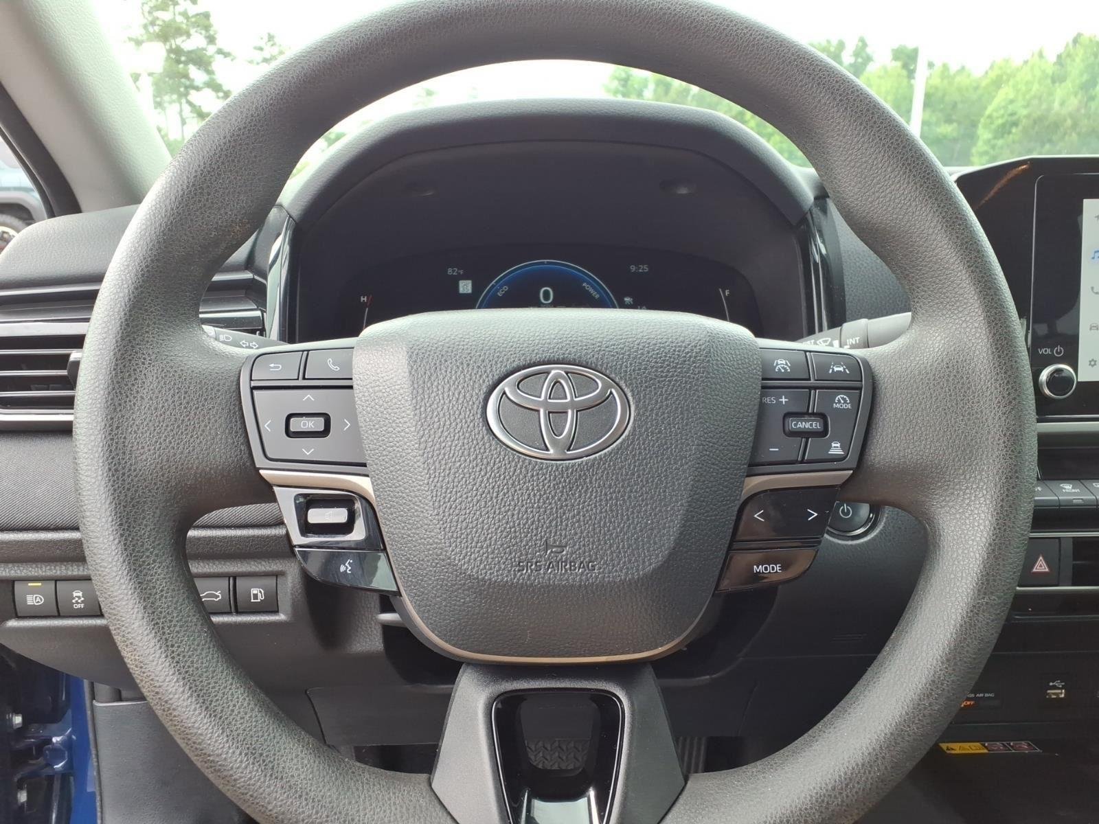 Used 2025 Reservoir Blue Toyota LE image 25