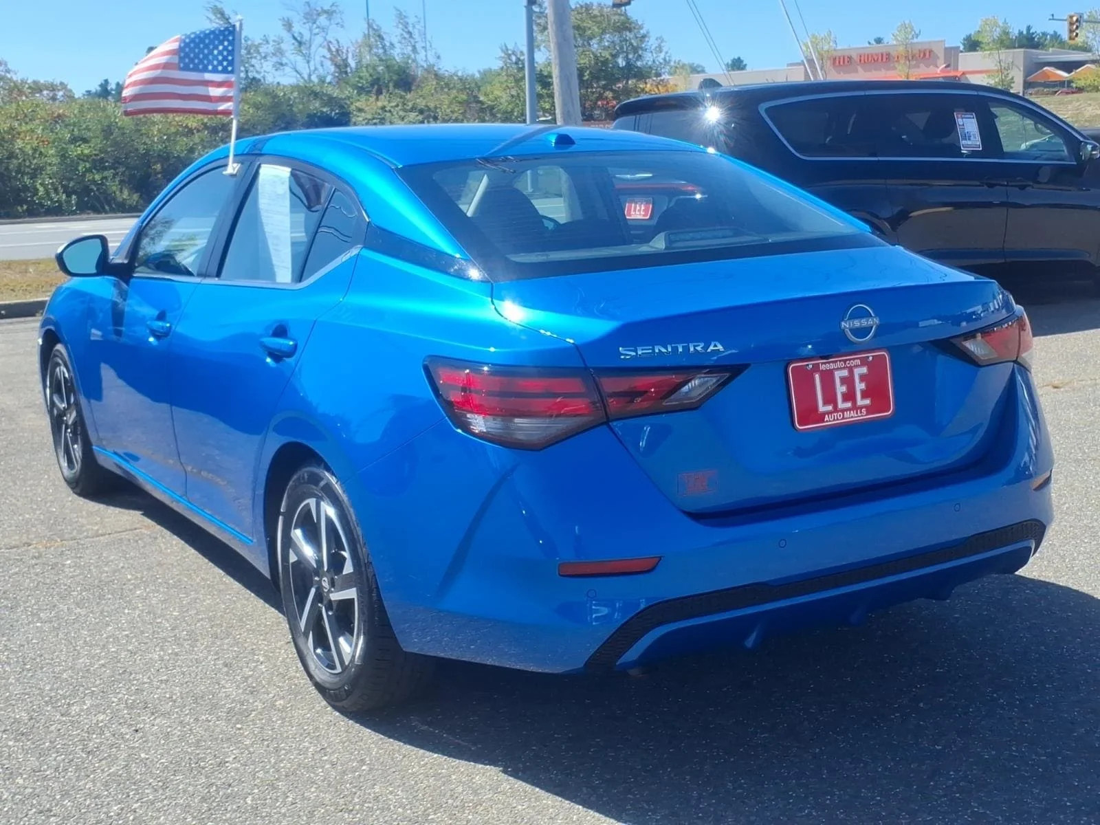 Used 2025 Electric Blue Metallic Nissan SV image 6