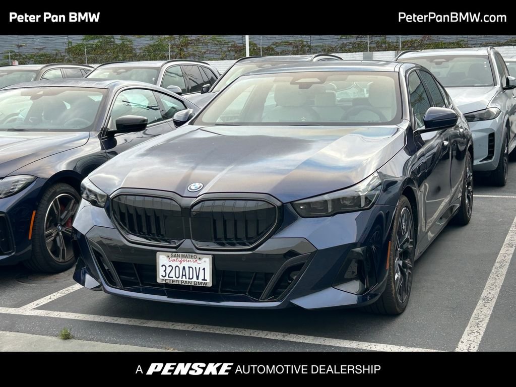 Used 2027 Blue BMW 550e xDrive image 1