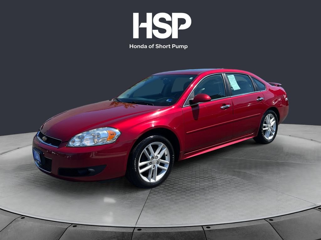 Used 2015 Crystal Red Tint Chevrolet LTZ image 1