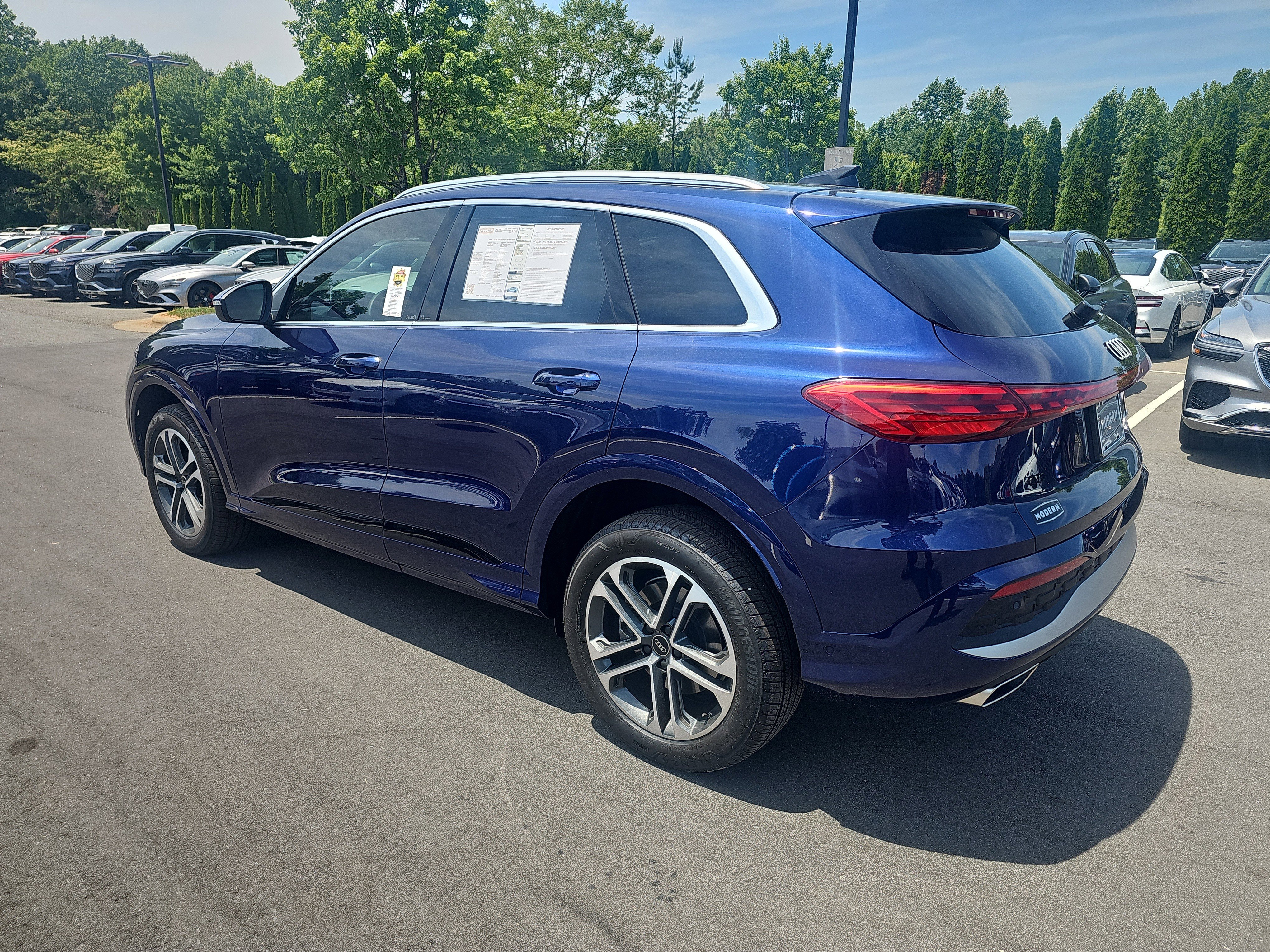 Used 2025 Navarra Blue Metallic Audi Premium Plus image 6