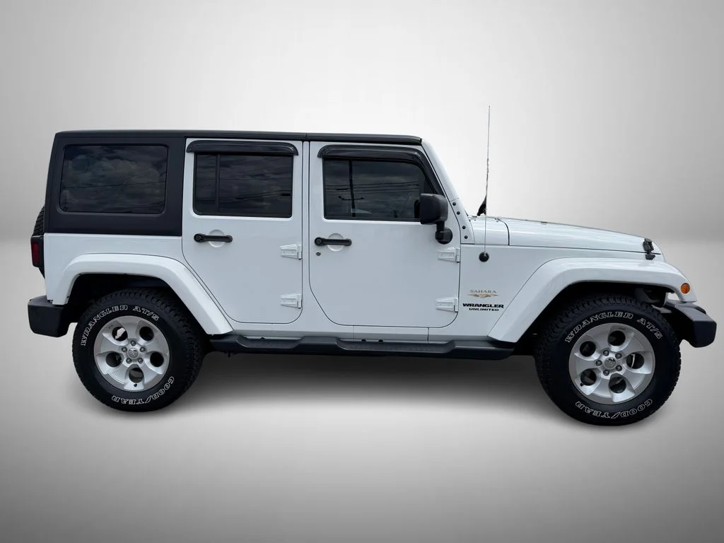 Used 2015 White Jeep Unlimited Sahara image 5
