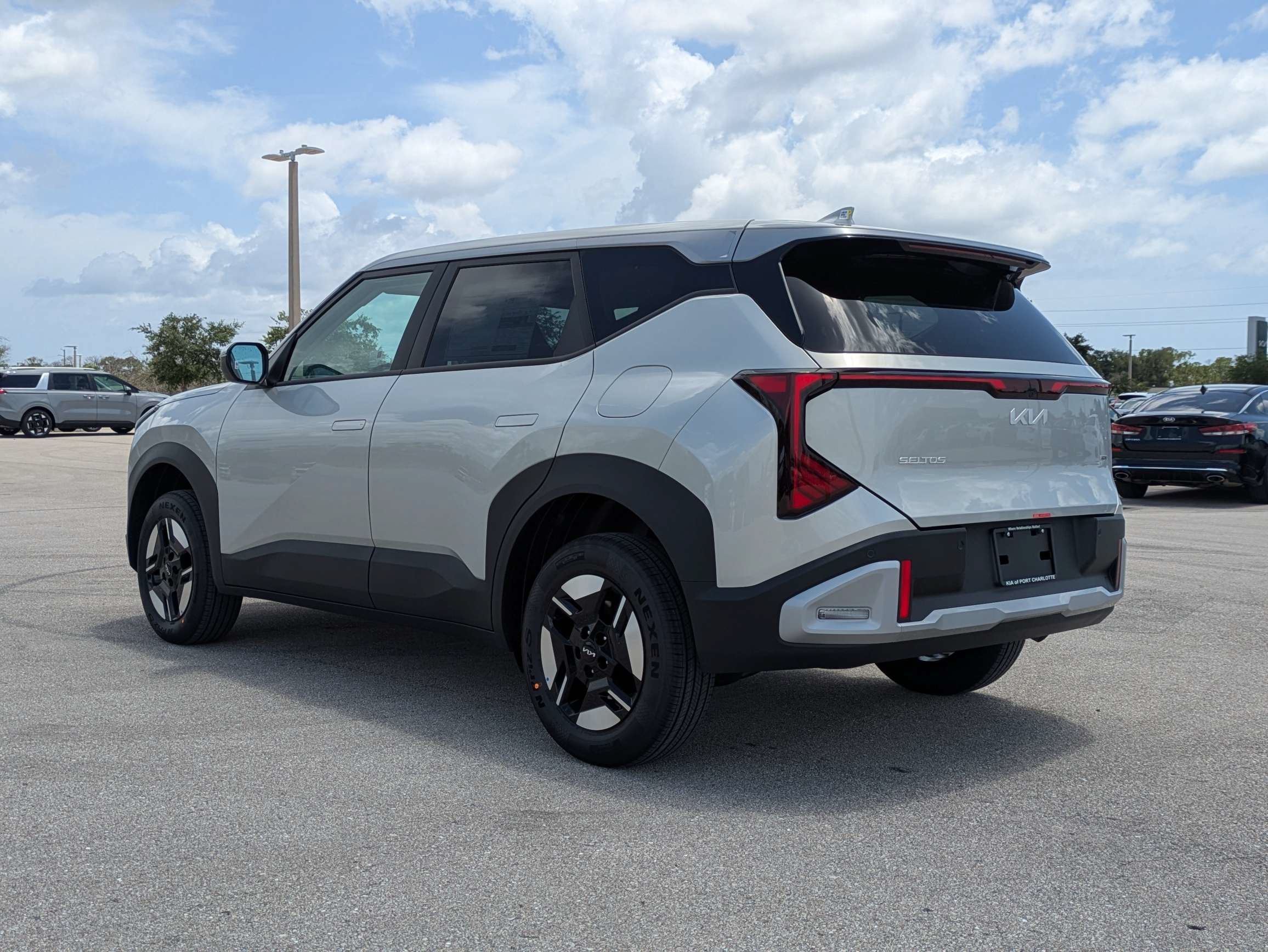 New 2027 Ivory Silver Kia LX image 7