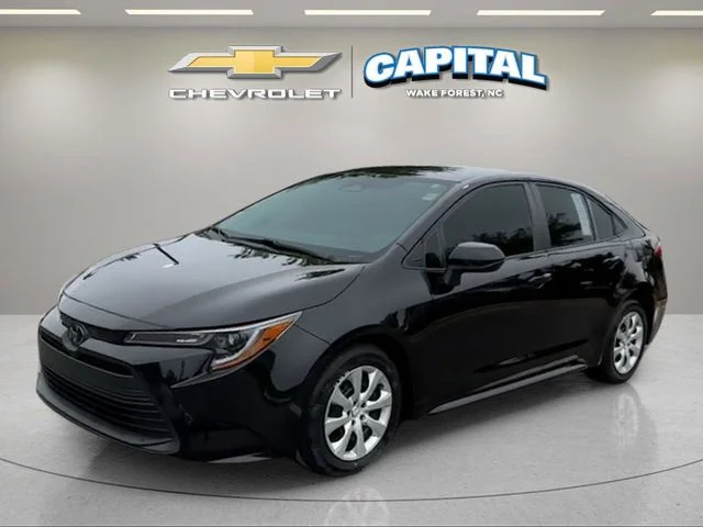 Used 2024 Black Toyota LE image 1