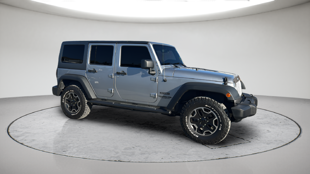 Used 2013 Silver Jeep Unlimited Sport image 6