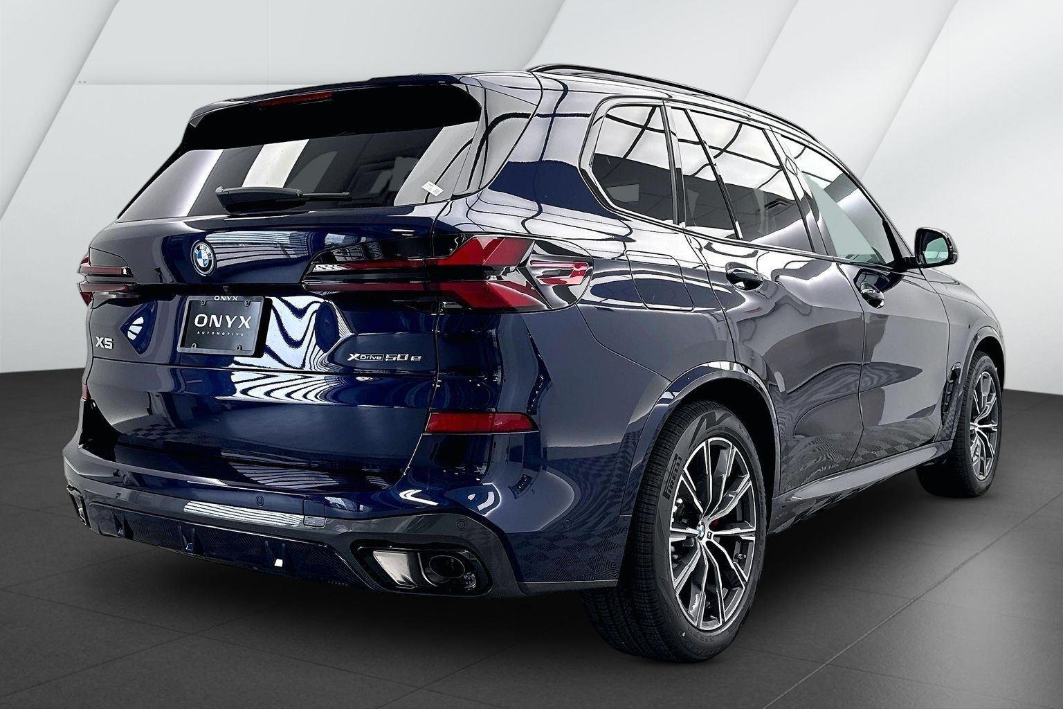 New 2026 Tanzanite Blue II Metallic BMW xDrive50e image 6