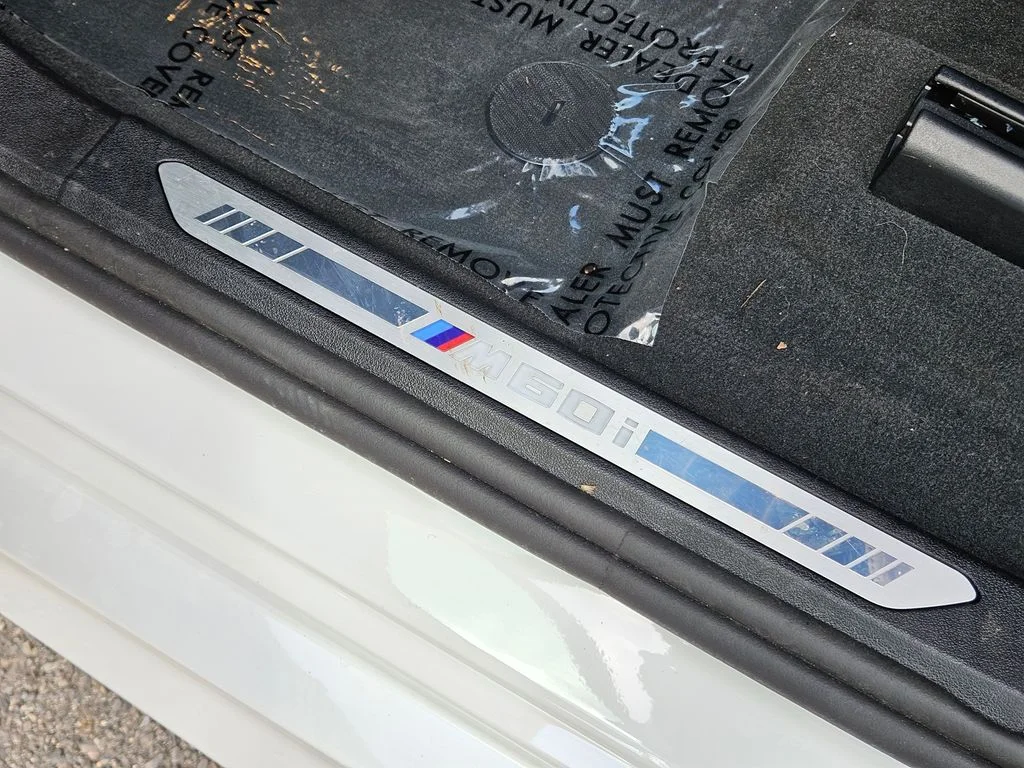 Used 2026 Mineral White Metallic BMW M60i image 43