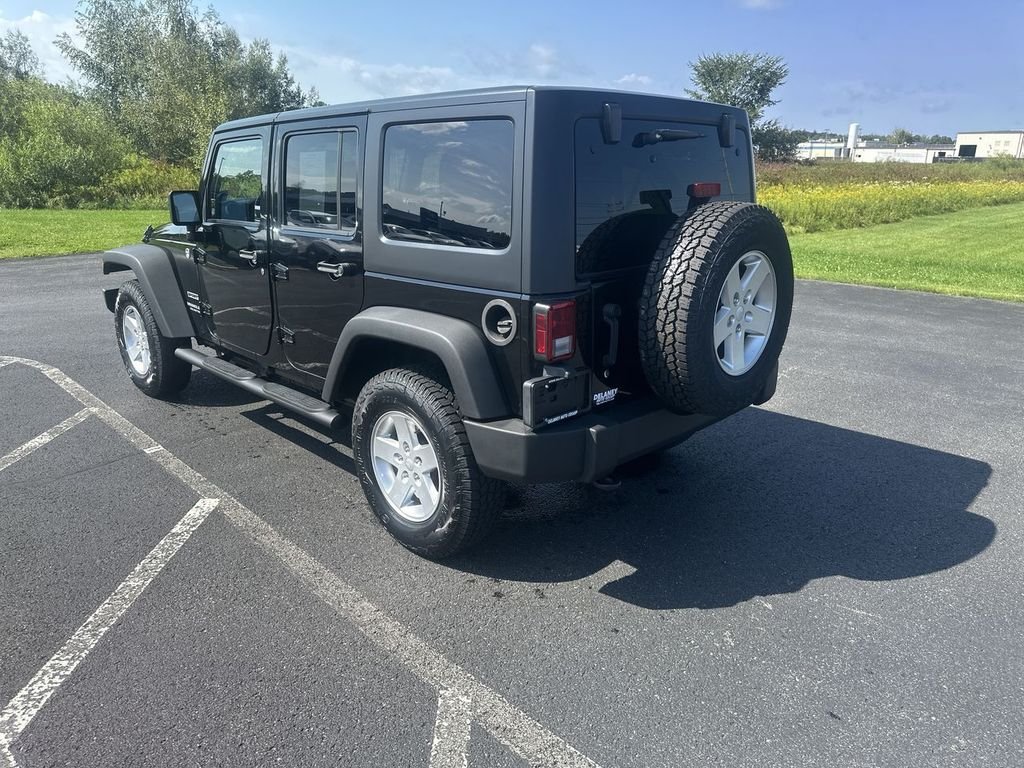 Used 2014 Black Jeep Unlimited Sport image 6
