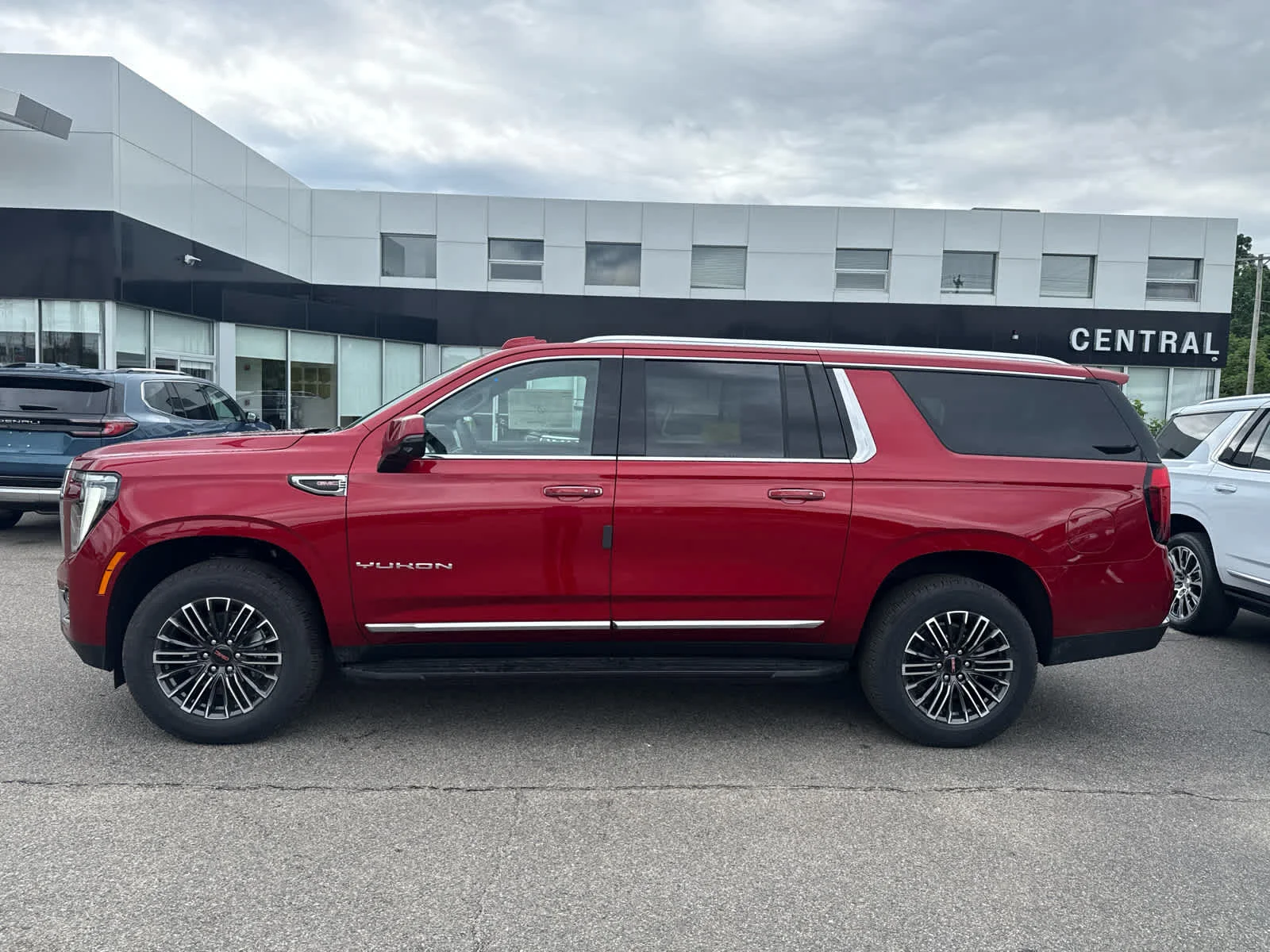 New 2026 Volcanic Red Tintcoat GMC Elevation image 2