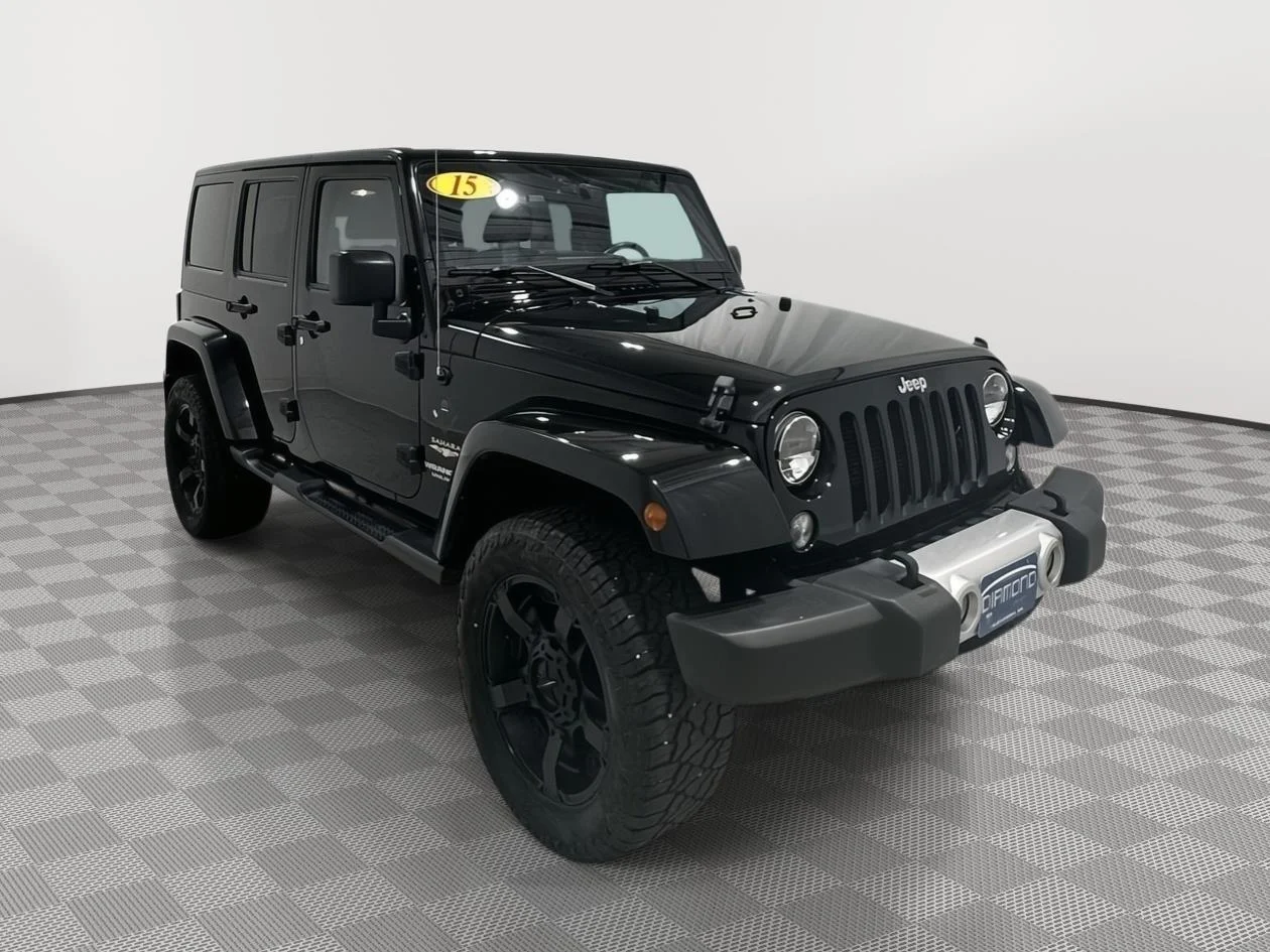 Used 2015 Black Jeep Sahara image 7