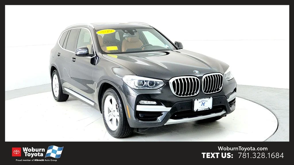 Used 2019 Gray BMW xDrive30i image 1