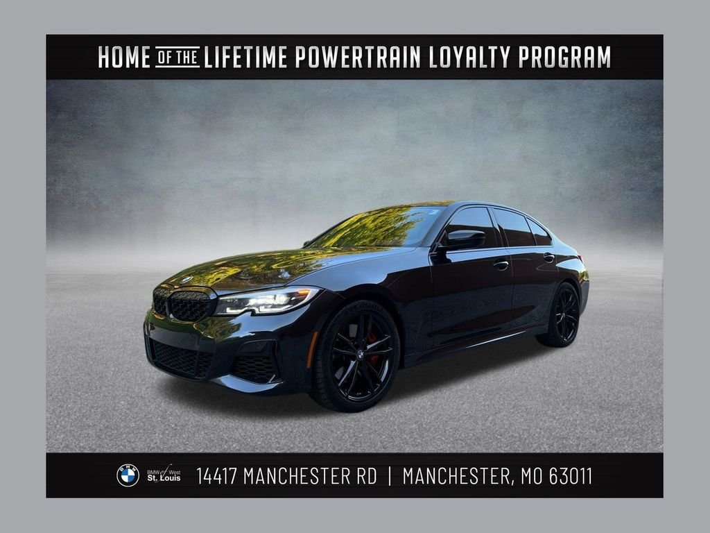 Used 2021 Black BMW M340i xDrive image 1