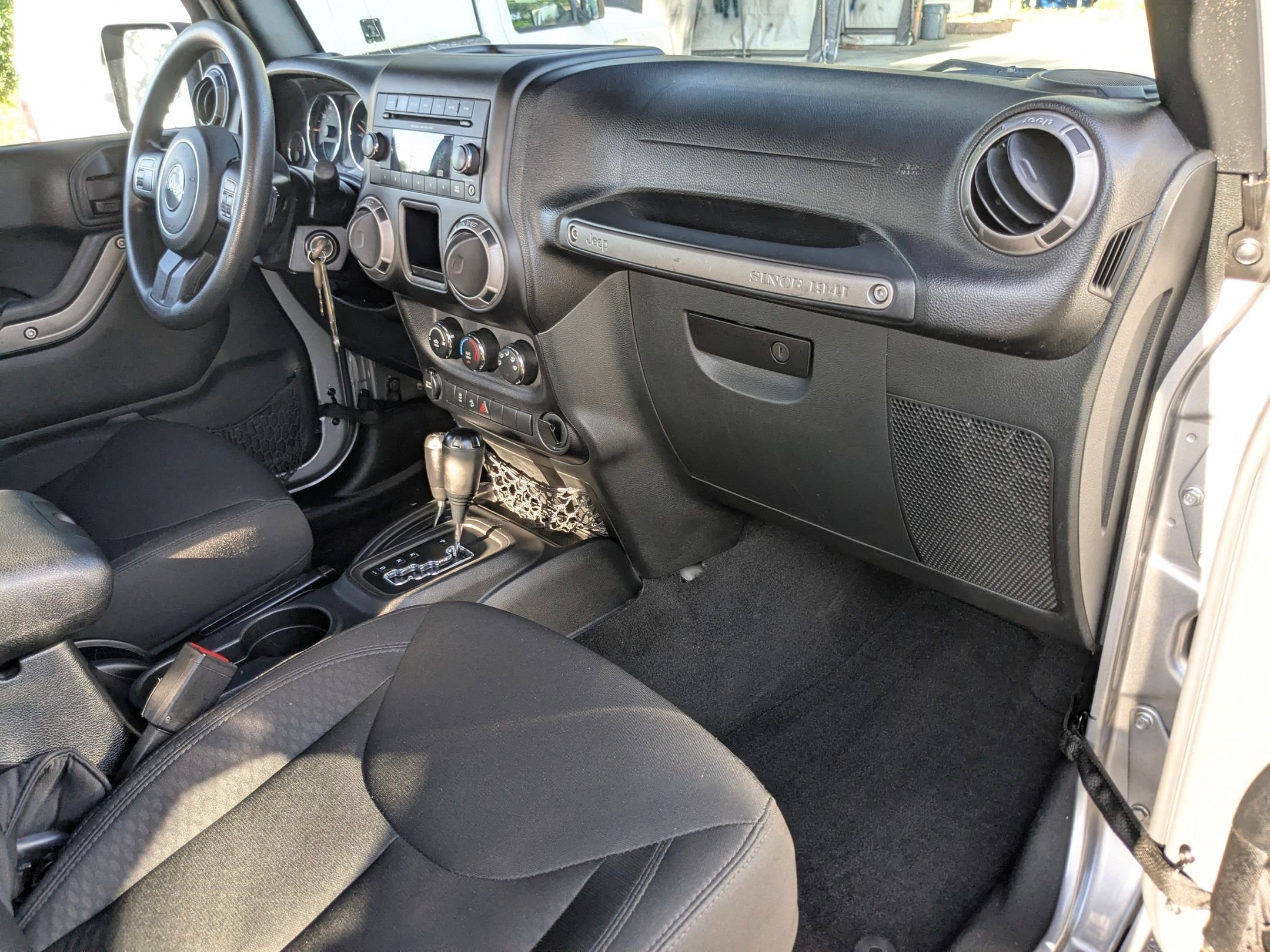 Used 2015 Billet Silver Metallic Clearcoat Jeep Sport image 22
