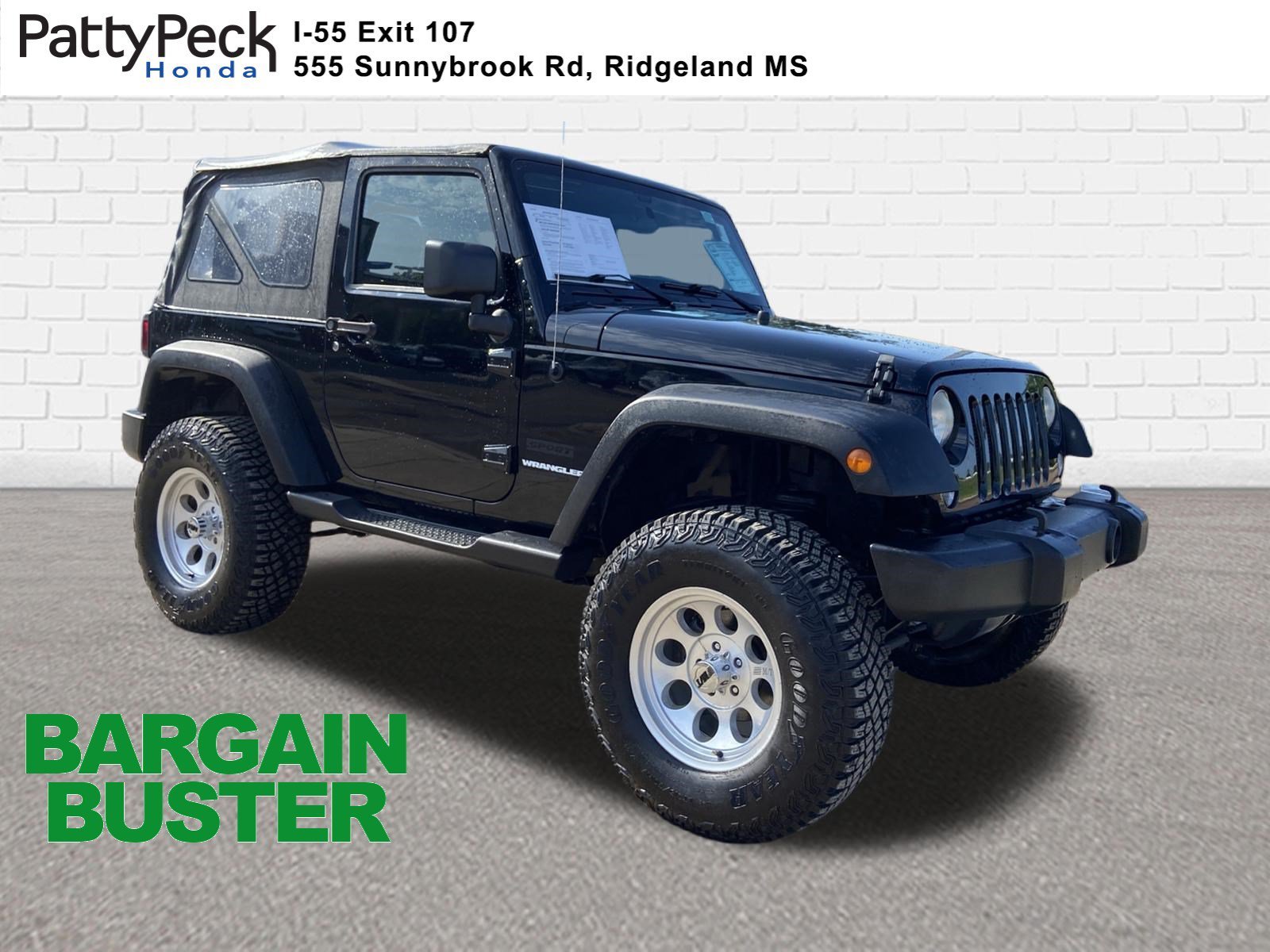 Used 2014 Black Clearcoat Jeep Sport image 1