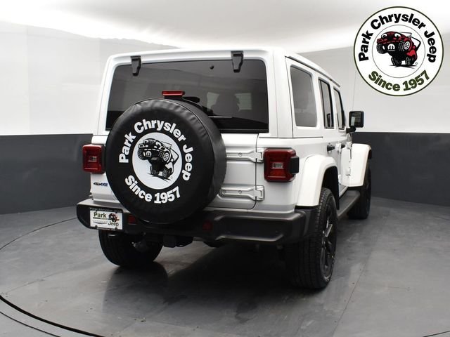 Used 2021 Jeep Wrangler Unlimited Sahara 4XE with VIN 1C4JJXP62MW500359 for sale in Burnsville, Minnesota