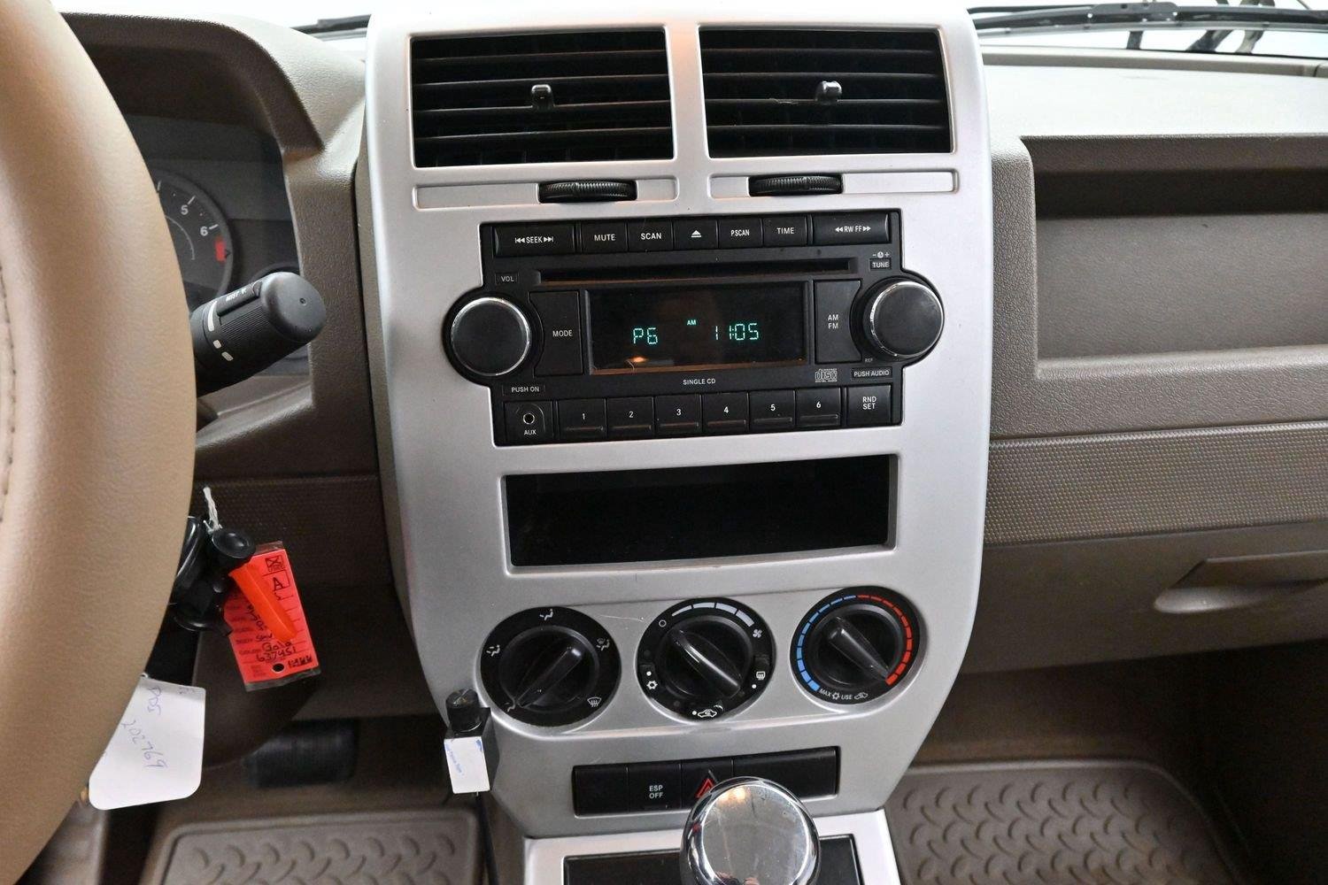 Used 2008 Light Khaki Metallic Jeep Sport image 17