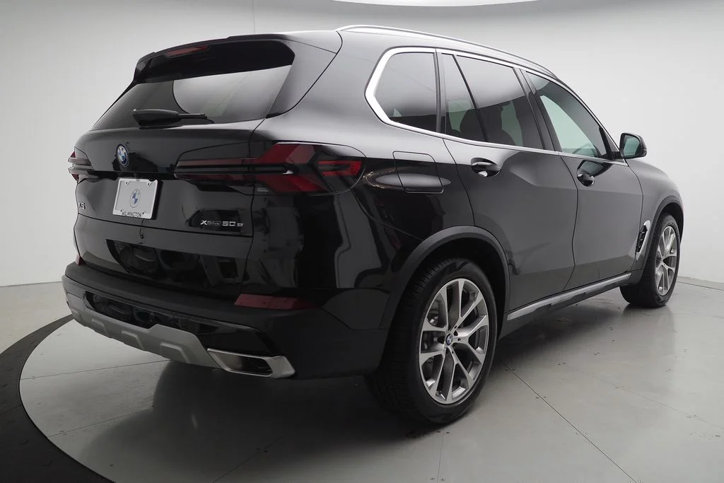 New 2026 Black Sapphire Metallic BMW xDrive50e image 3