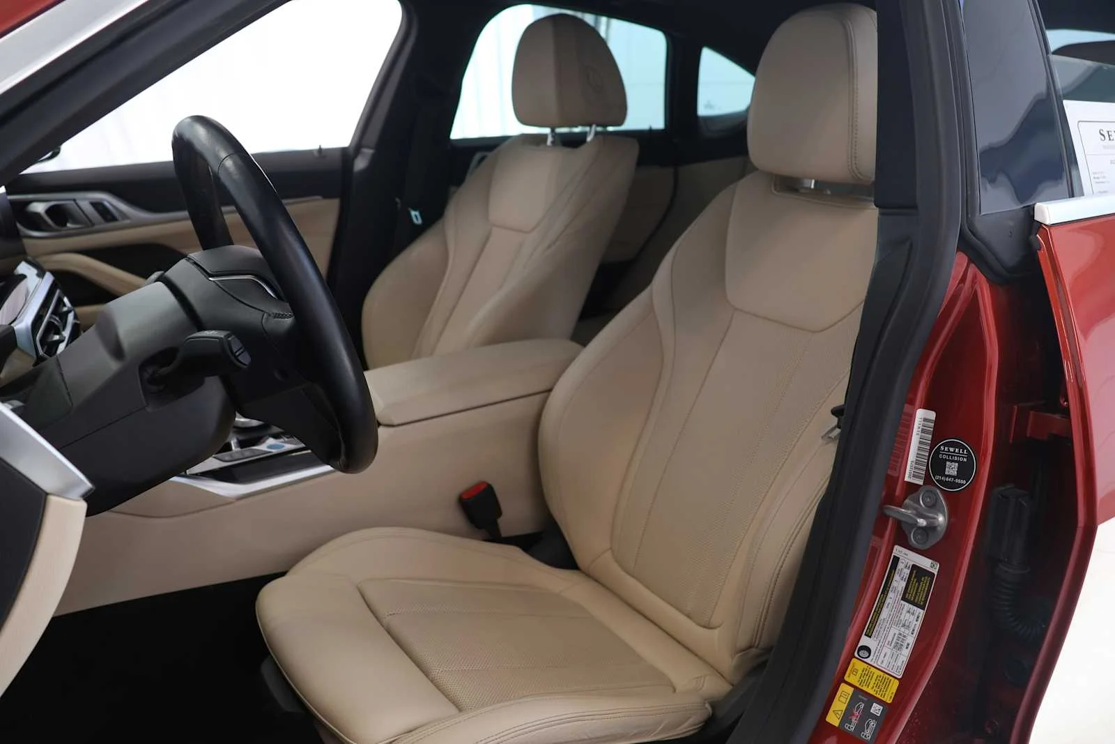 Certified Used 2023 Sunset Orange Metallic BMW eDrive40 image 10