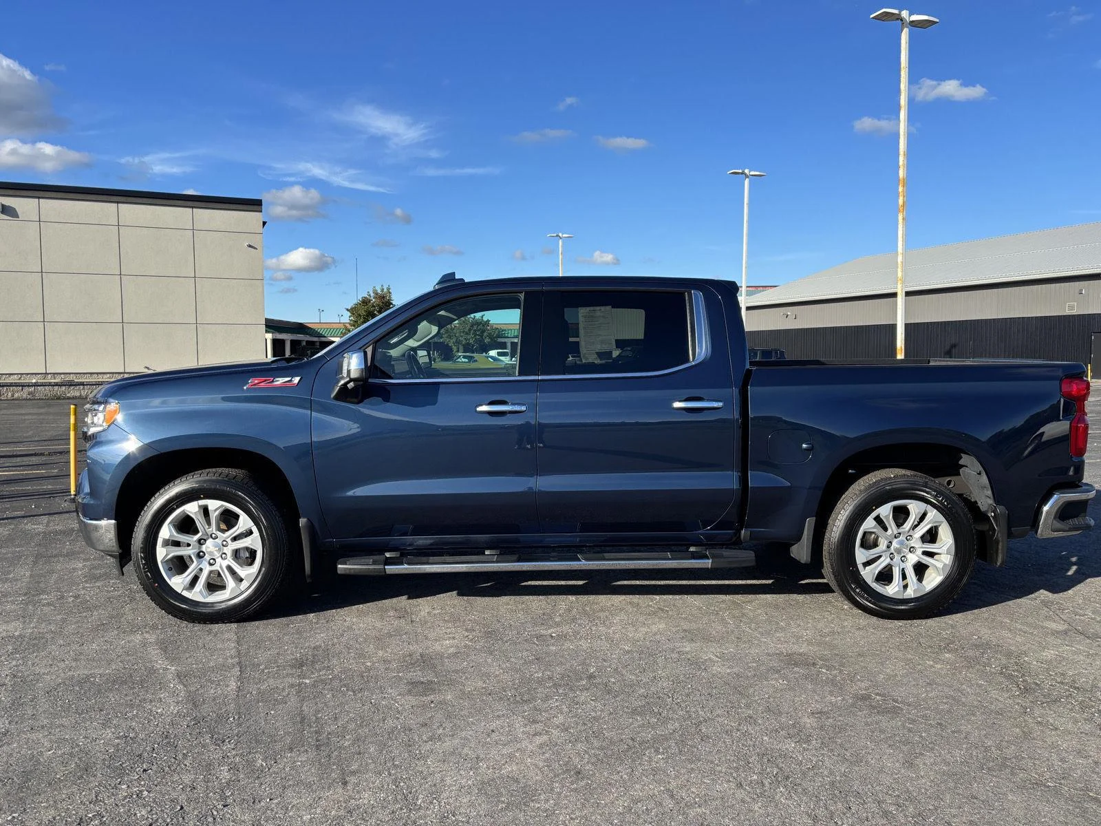 Used 2022 NORTHSKY BLUE METALLIC Chevrolet LTZ image 4