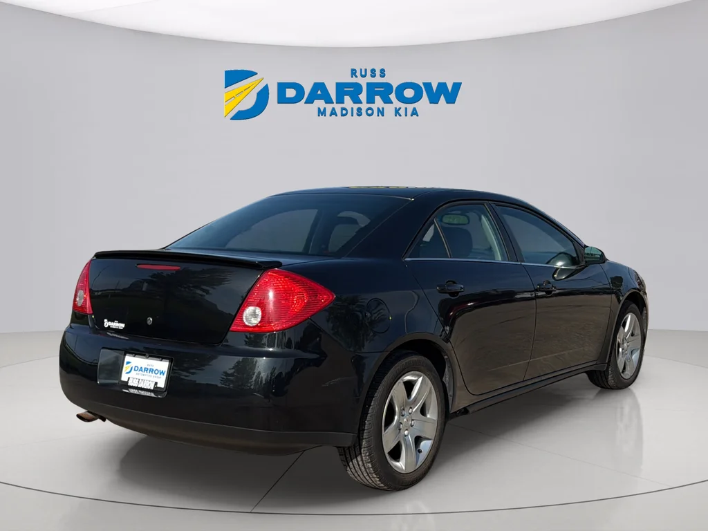 Used 2009 Carbon Black Metallic Pontiac Base image 5