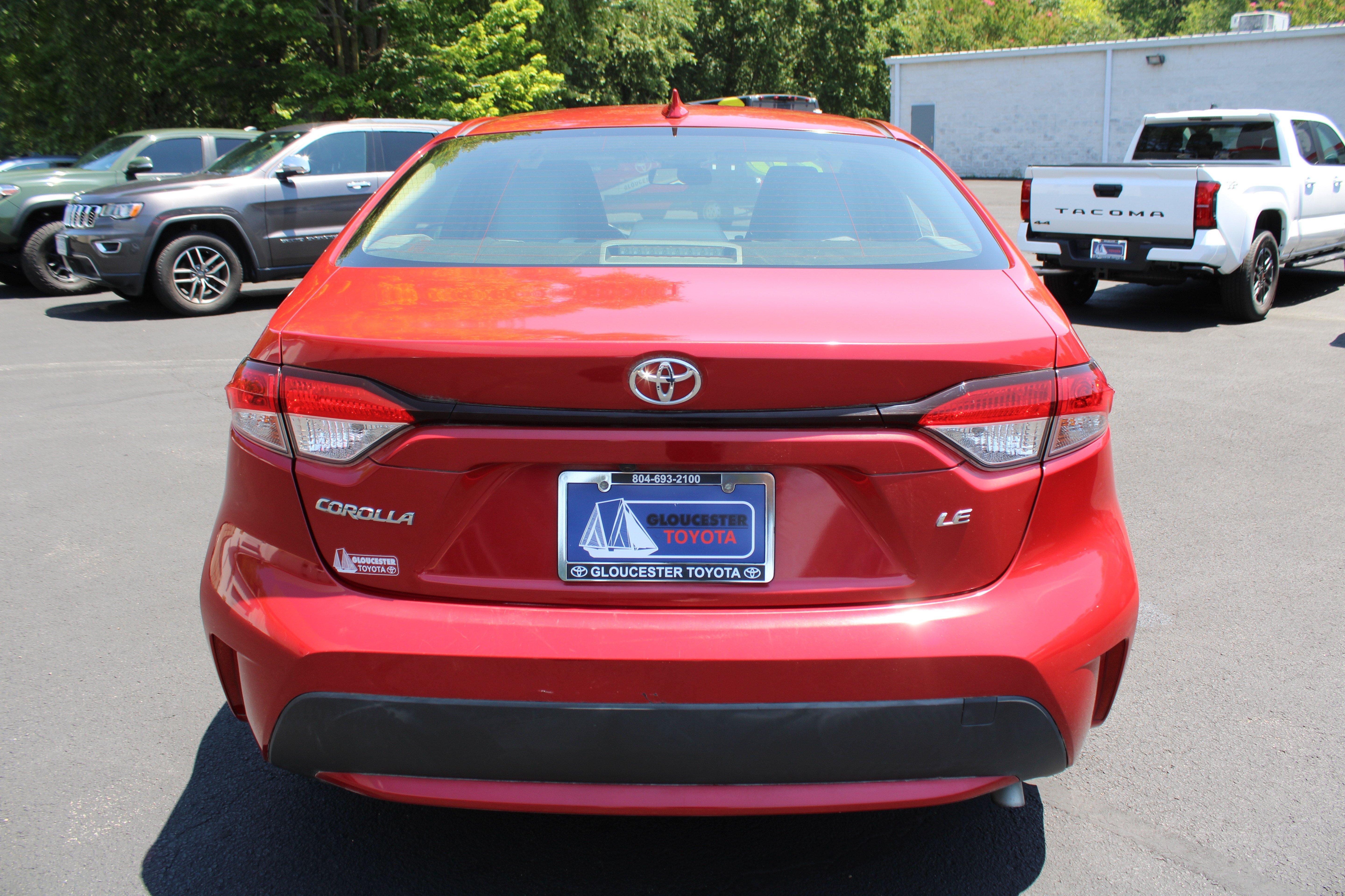 Used 2020 Barcelona Red Metallic Toyota LE image 6