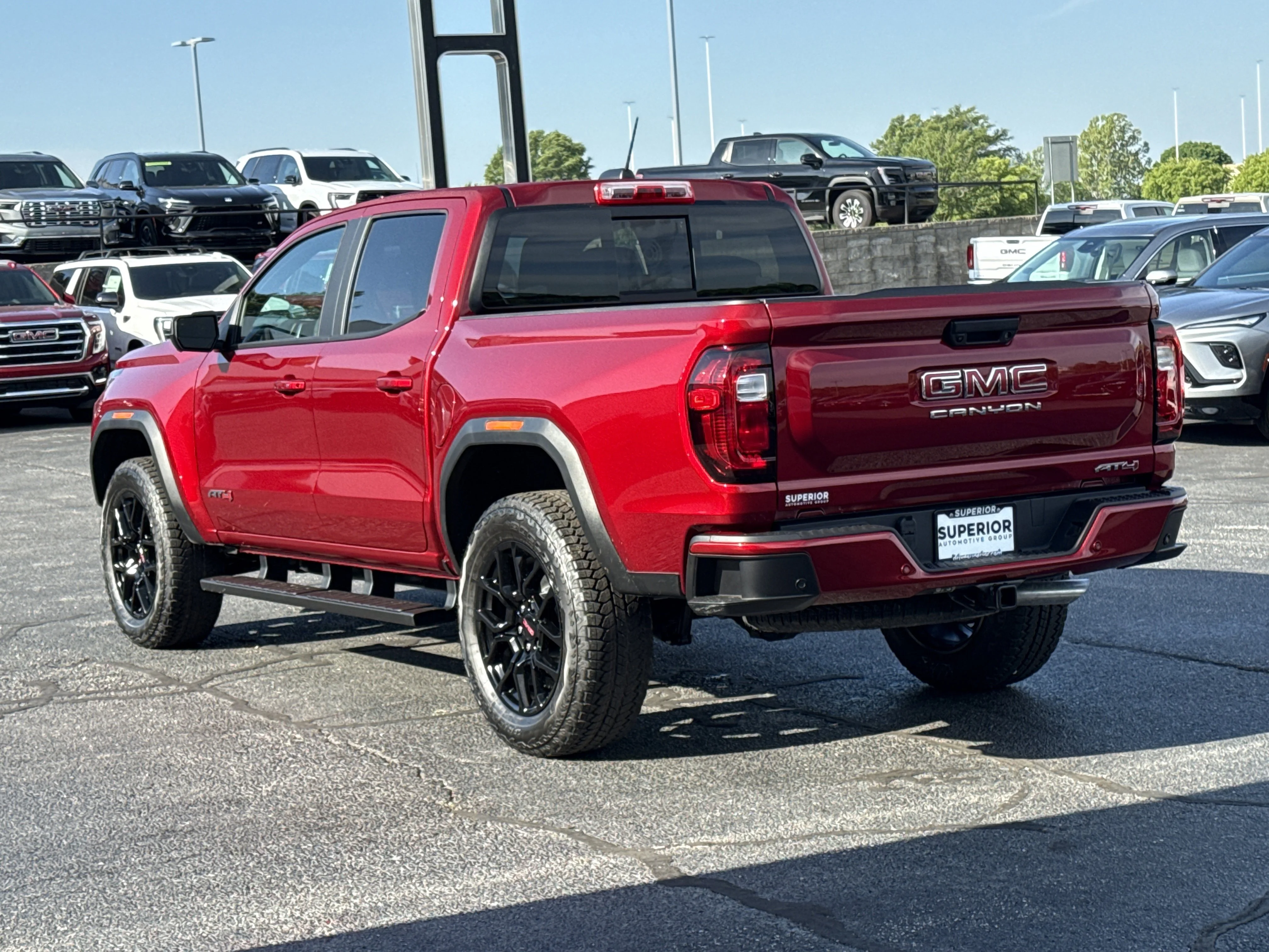 New 2026 Volcanic Red Tintcoat GMC 4WD AT4 image 11