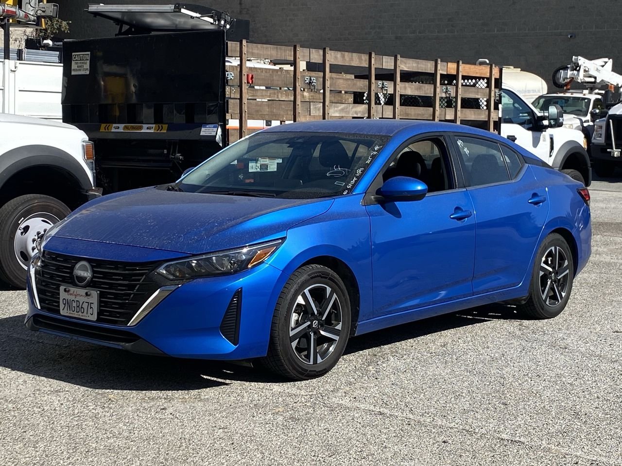 Used 2025 Electric Blue Nissan SV image 1