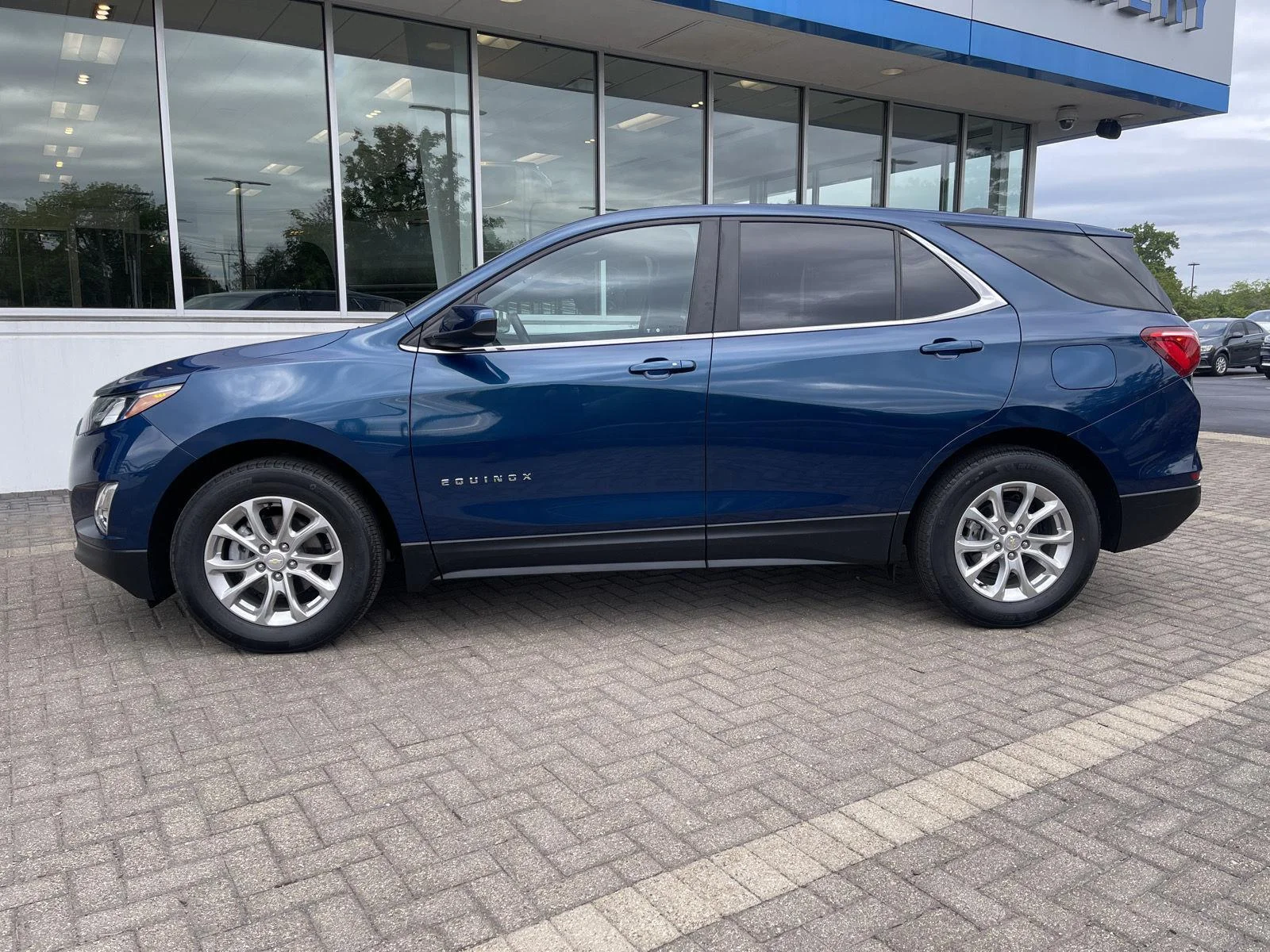 Used 2021 PACIFIC BLUE METALLIC Chevrolet LT image 2