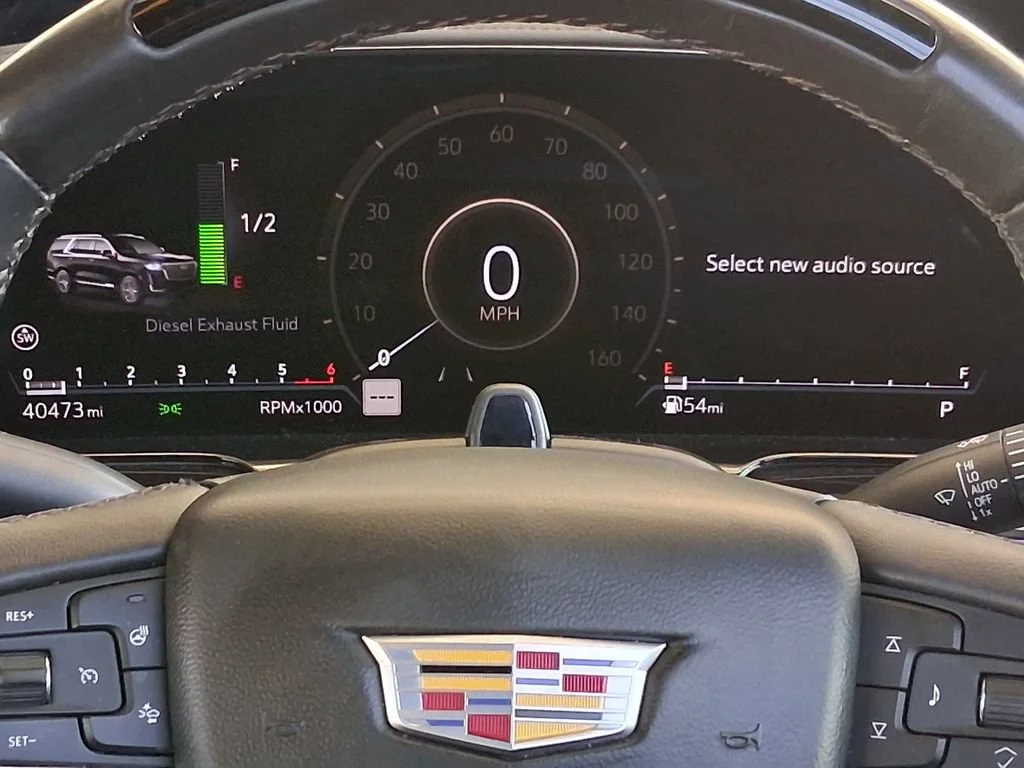 Used 2024 Radiant Red Tintcoat Cadillac Sport image 14