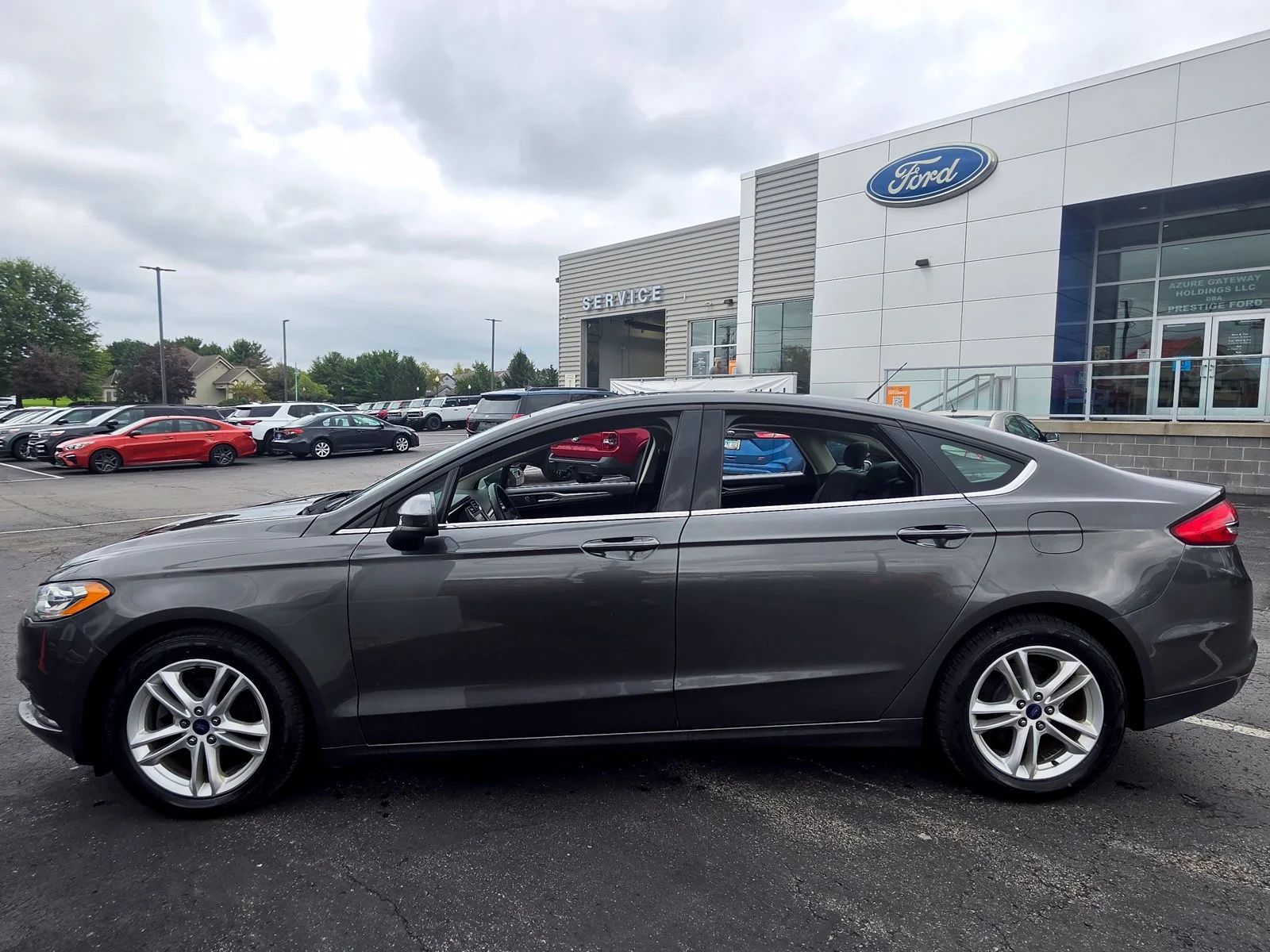 Used 2018 Ford Fusion SE with VIN 3FA6P0HD7JR149137 for sale in Columbiana, OH