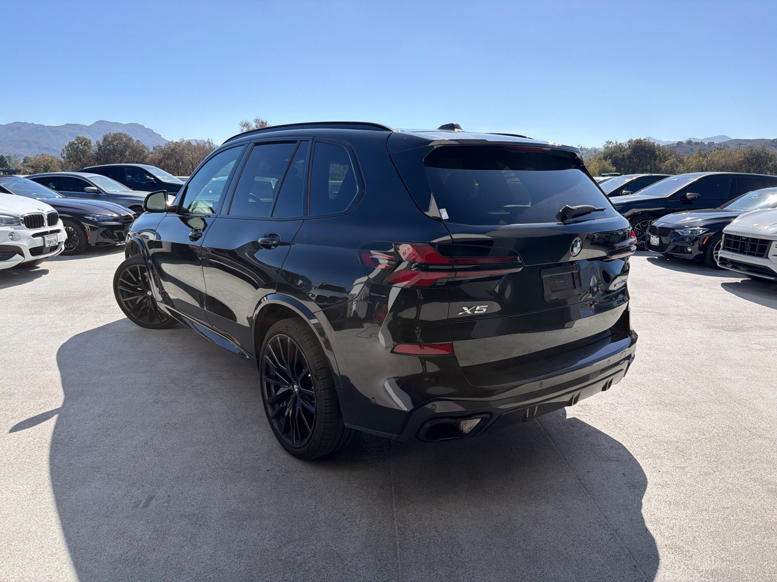 Used 2024 Black Sapphire Metallic BMW sDrive40i image 2