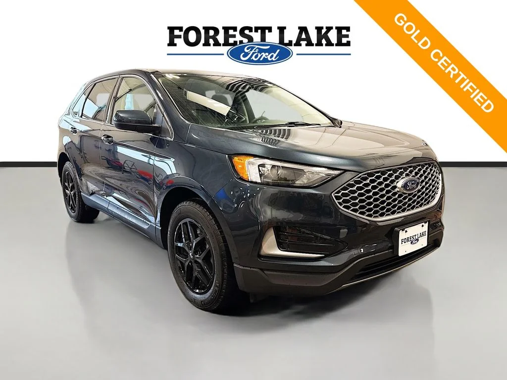 Certified Used 2023 Blue Metallic Ford SEL image 1