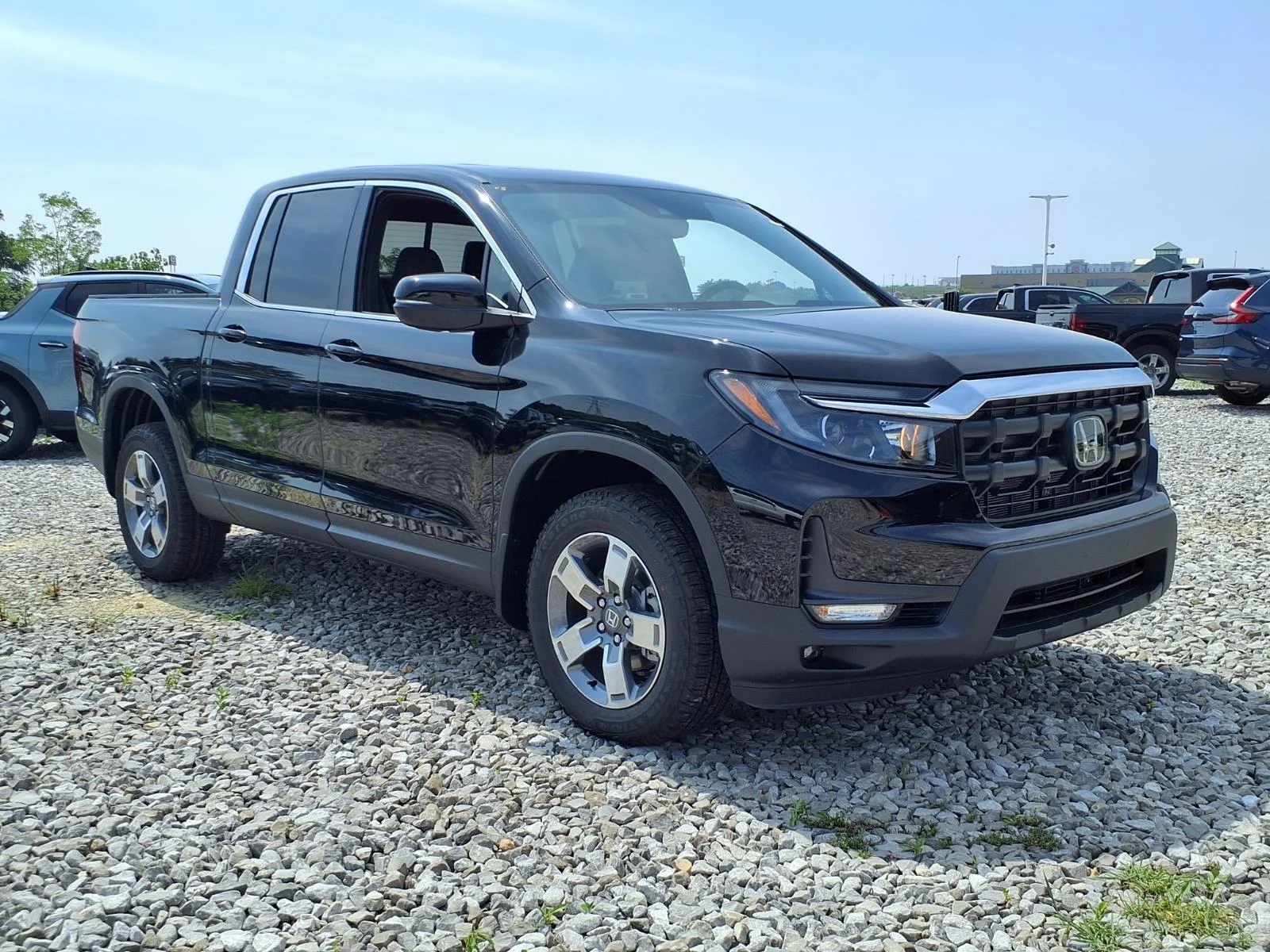 New 2026 Crystal Black Pearl Honda RTL AWD image 1