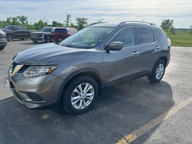 Used 2016 Gun Metallic Nissan SV image 1