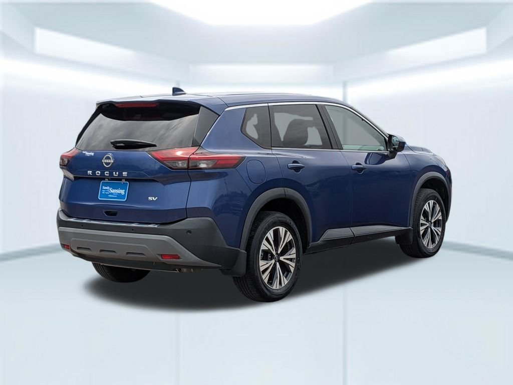 Used 2023 Caspian Blue Metallic Nissan SV image 6