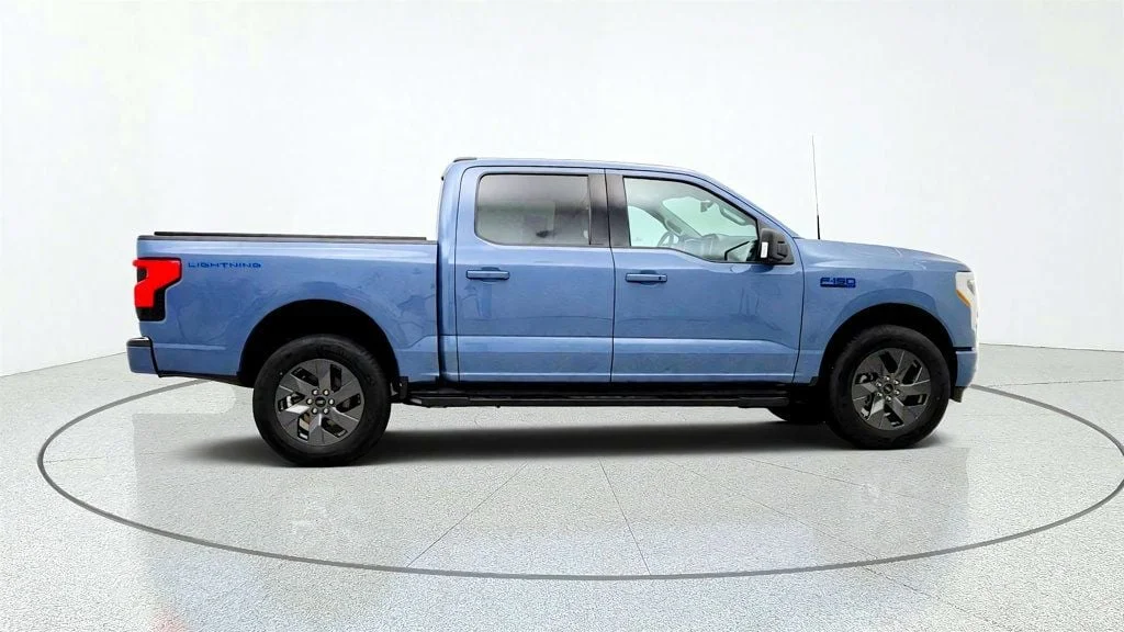 Used 2023 Azure Gray Metallic Tri-Coat Ford XLT 4WD SuperCrew 5.5