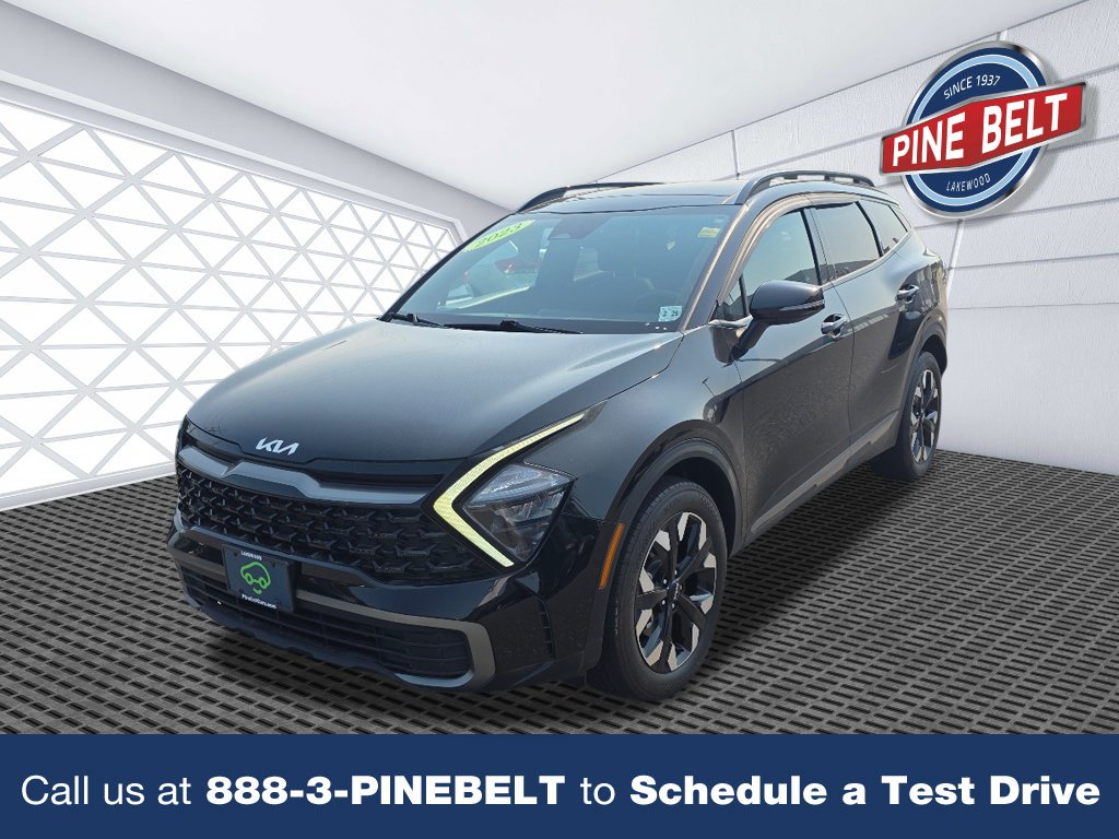 Used 2023 Ebony Black Kia X-Line image 1