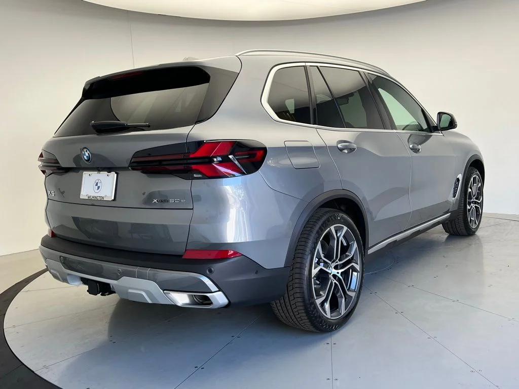 Used 2026 Skyscraper Grey Metallic BMW xDrive50e image 3
