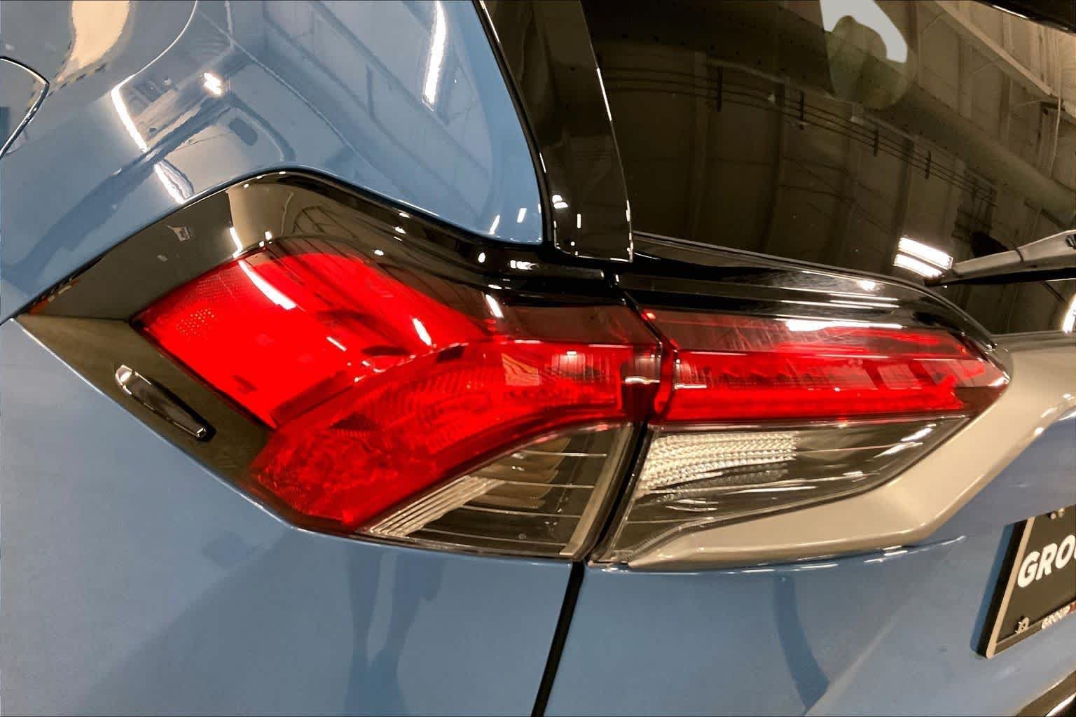 Used 2023 Cavalry Blue/Midnight Black Metallic Toyota Hybrid XSE image 28